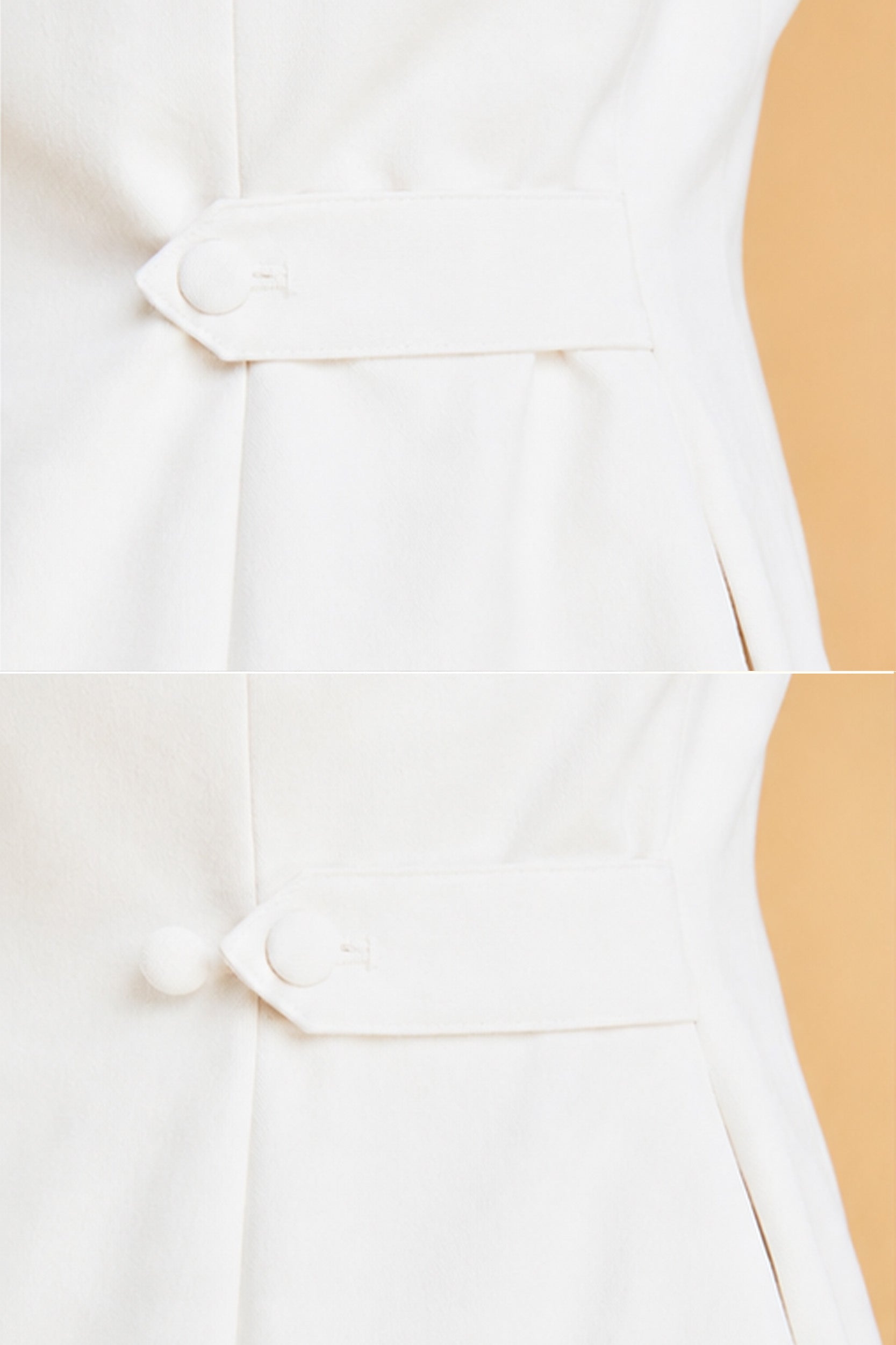 Close-up of a white blouse with buttons on a beige background